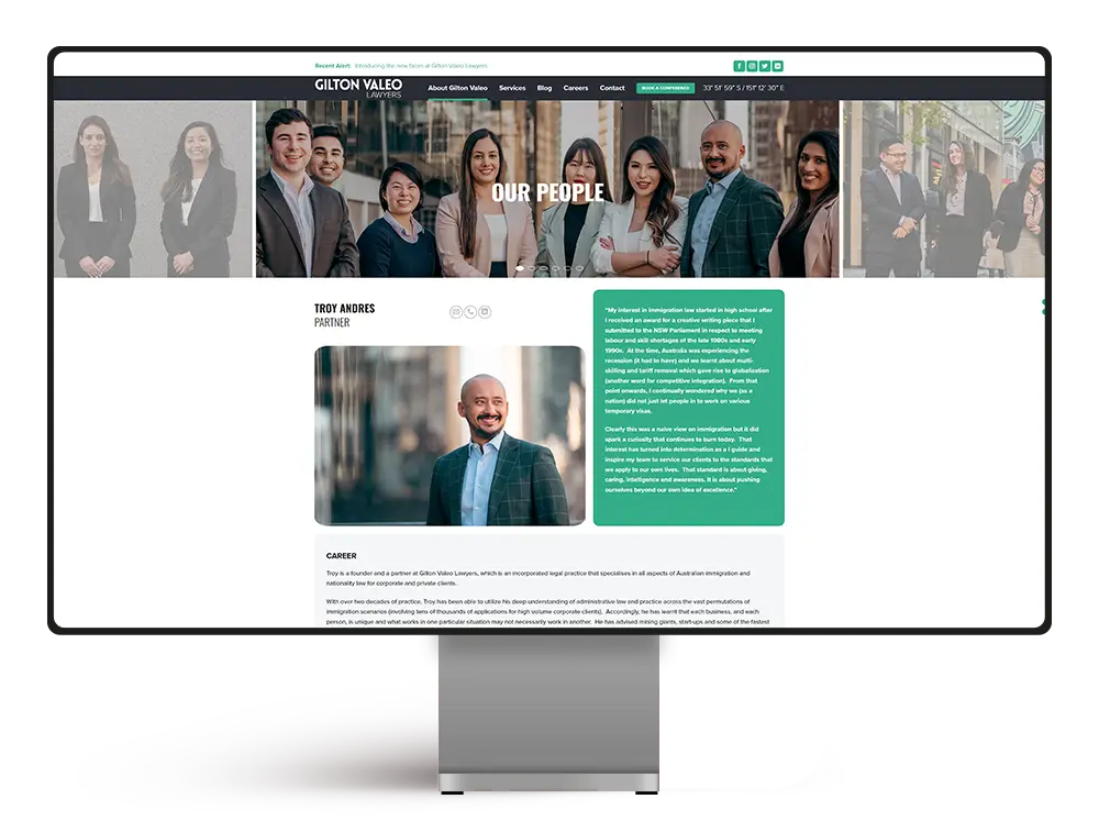 Gilton Valeo Lawyers website superimposed on desktop monitor